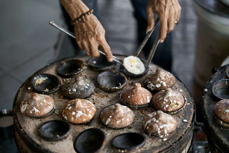 Street stone barbecue with grilled eggs in Vietnamの写真素材