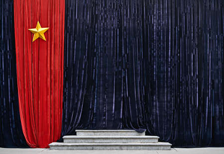 Massive curtains with Vietnam flag with shiny metal star outdoorsの写真素材