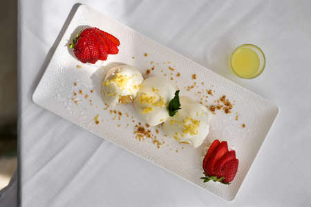 Appetizing dessert with strawberries and fresh drinkの写真素材