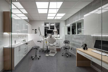 Contemporary dental clinic with light interior and hi-tech equipmentの写真素材