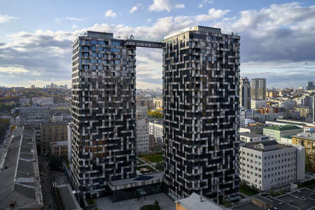 Aerial view at cityscape with modern high-rise housesの写真素材