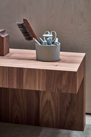 Closeup view at brown wood stand with objectsの写真素材