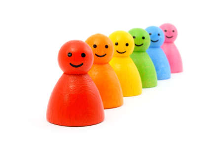 Six colorful gaming pieces smiling. Isolated on white.の写真素材