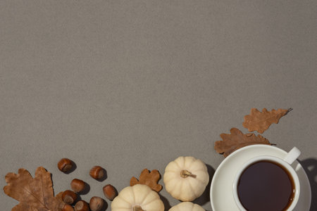 Autumn background with bright leaves and pumpkins