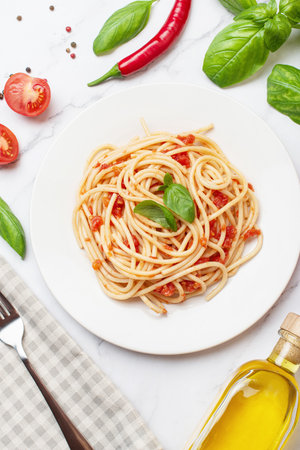 Italian bolognese pasta on a gray marble table. View from aboveの写真素材
