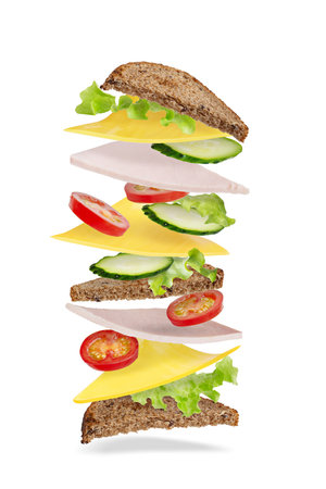 sandwich with salami and cheese flying on a white isolated background. Flying ingredients.の写真素材