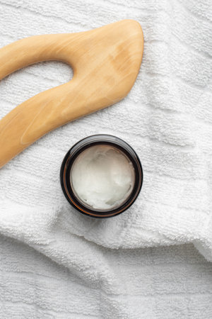 background with cosmetic products for body care. gray bathroom. Means for massage.の写真素材