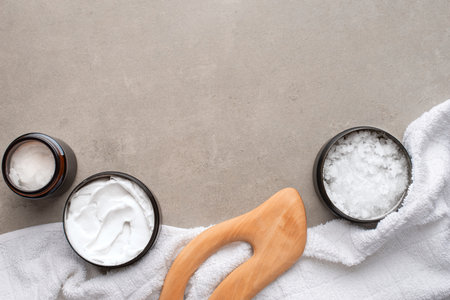 background with cosmetic products for body care. gray bathroom. Means for massage.の写真素材