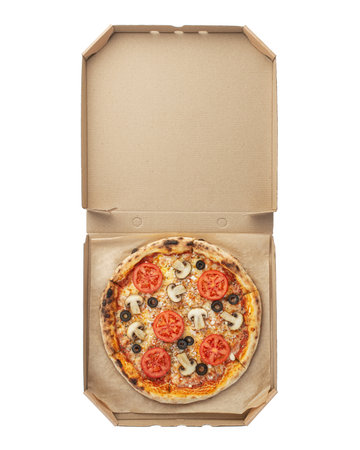 Pizza margherita with tomatoes and mushrooms on a white isolated backgroundの写真素材