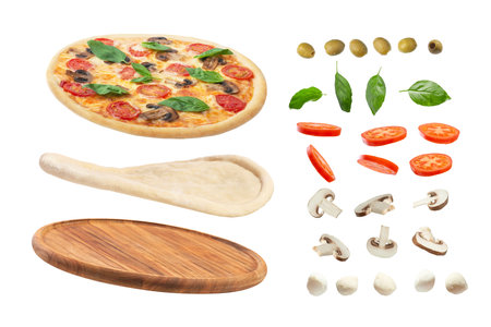 Pizza with mushrooms, tomatoes, cheese and basil on a white background. Falling ingredients. Levitationの写真素材