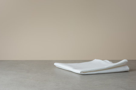 white cooking towel on this background, side viewの写真素材