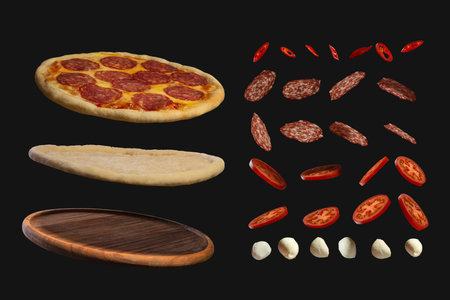 pepperoni pizza with ingredients on a black isolated backgroundの写真素材