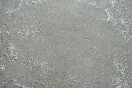 Spices scattered on a gray background, top viewの写真素材