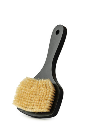 Black brush for dry massage on a white isolated backgroundの写真素材