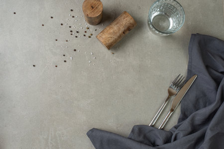 culinary series marble background with spices and cutleryの写真素材