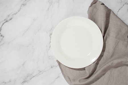 White plate on a gray backgroundの写真素材