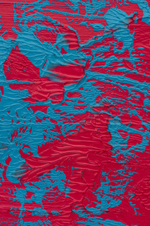 Chaotic macro texture of pink and blue paintの写真素材