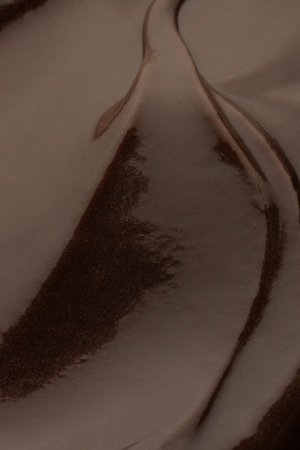 Dark Chocolate Smear Texture on Neutral Backgroundの写真素材