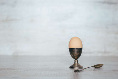 egg in the pastern on a light wooden backgroundの写真素材