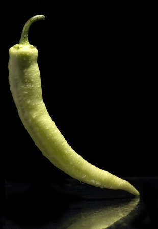 green paprika with water dpors on it