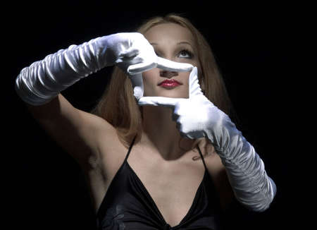 portrait of beauty woman with white gloves の写真素材