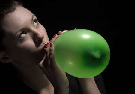 beauty blower puff a green balloonの写真素材