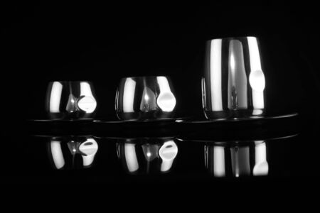 black and white metal chrome cups for coffeeの写真素材