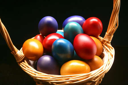 the Easter eggs are standing in basket