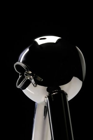 little metal shiny robot with zipper mouth