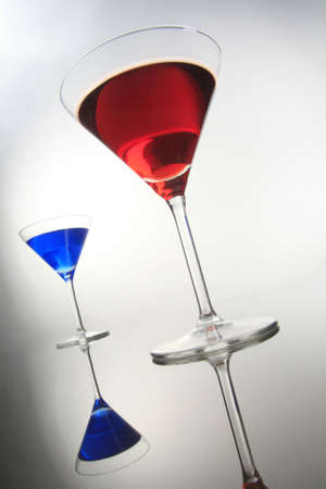 two coctails in diagonal composition on gray backgroundの写真素材