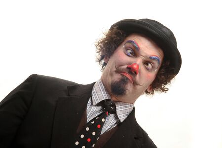 a funny clown is making silly faces
