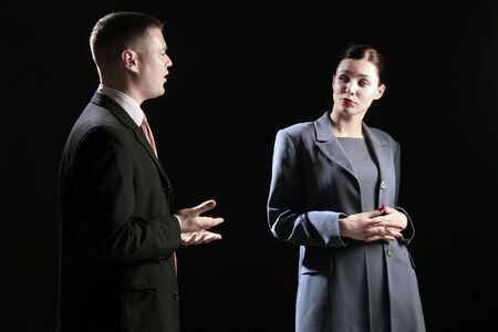 two business people at the meeting on black