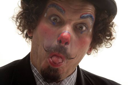 portrait of a funny clown looking on white