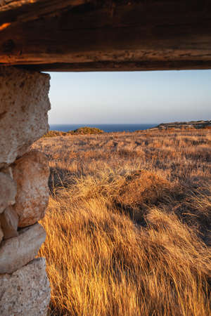 Abandoned house on the coast of Milos Island, Cyclades, Greeceの写真素材