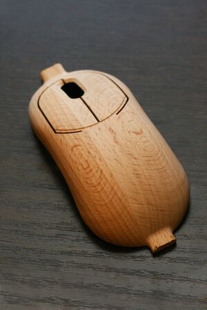 The case of the wooden computer mouse, close upの写真素材