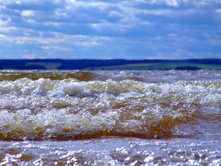 Summer, landscape with waves and cloudsの写真素材