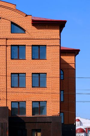 Building office centre on background blue sky. Russia