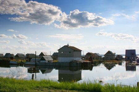 The flooded buildings after long-lasting rains on Ural. Russiaの写真素材