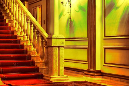 Marble stairway with red rug in theaterの写真素材