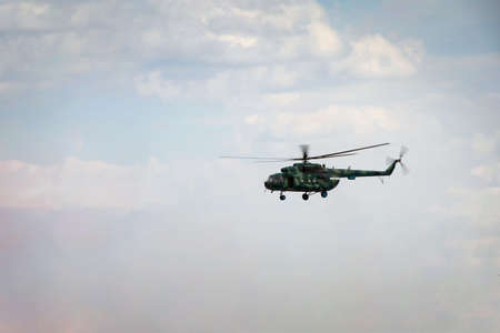 View of the flying Russian military helicopterの写真素材