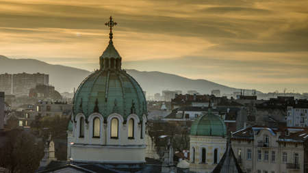 Beautiful sunset over Temple St. St. Cyril and Methodius against the backdrop of Vitosha Mountain in Sofia. Bulgariaのeditorial素材