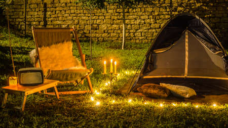 Romantic evening with a tent at night in the yard.の写真素材