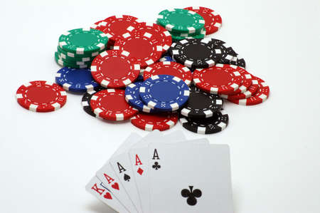 Poker, Four Aces and Chips on White