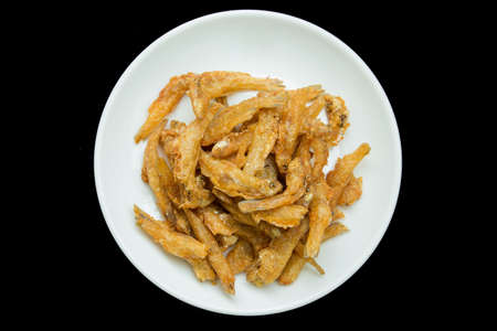Little fish is fried on dishの写真素材