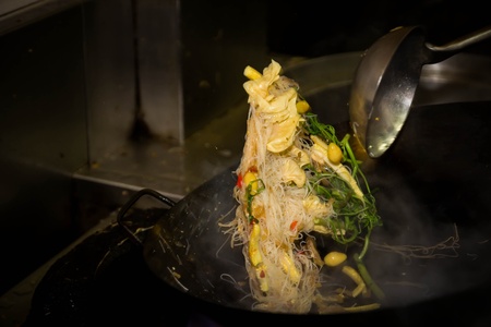 Vegetarian cooking,White noodle with mimosa stir fire on iron panの写真素材