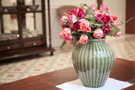 Beautiful rose flower bouquet on wooden tableのeditorial素材