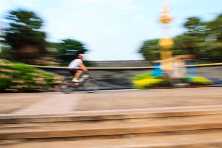 Biking taken with low speed shutterの写真素材