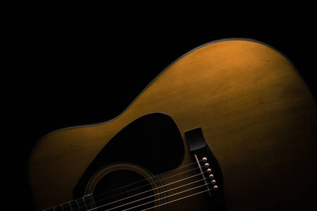 Acoustic guitar painted with lightの写真素材