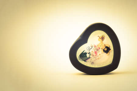 Retro gift in heart shape for loveの写真素材