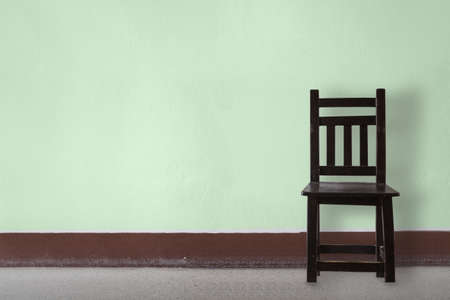 Wooden Chair vintage  in front wallの写真素材